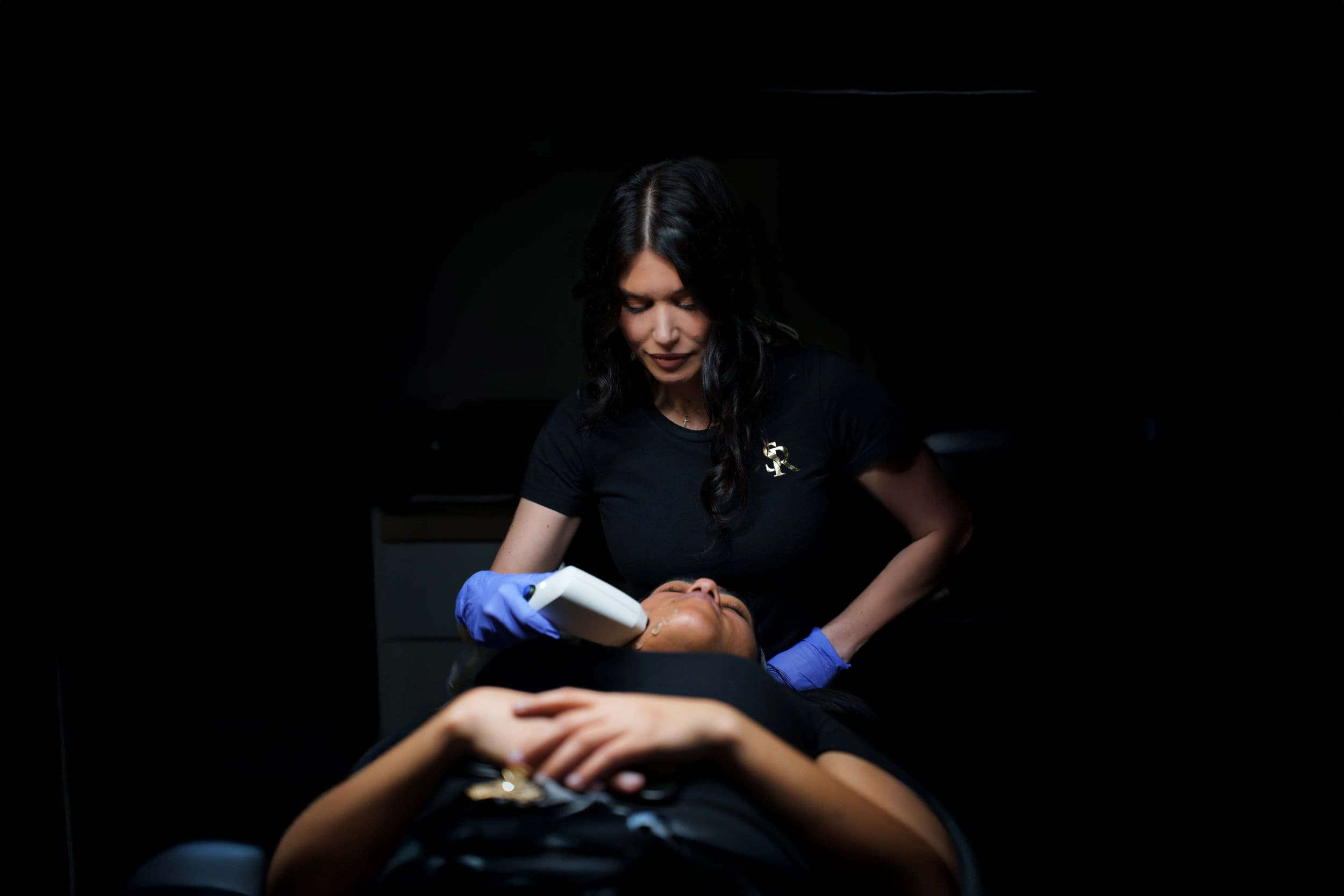 Erica Current giving a client a Sofwave treatment at The Skin Room